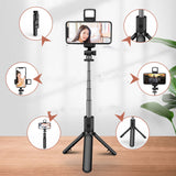 Compatible with Apple: Multifunctional selfie stick with Bluetooth integration and tripod function