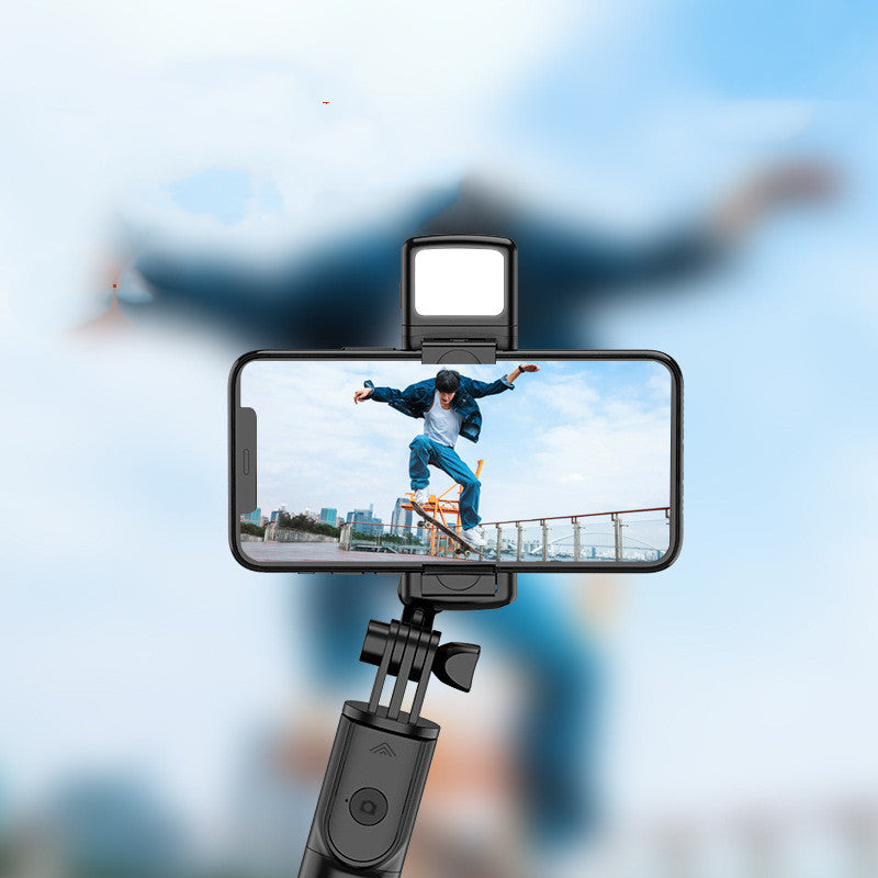 Compatible with Apple: Multifunctional selfie stick with Bluetooth integration and tripod function